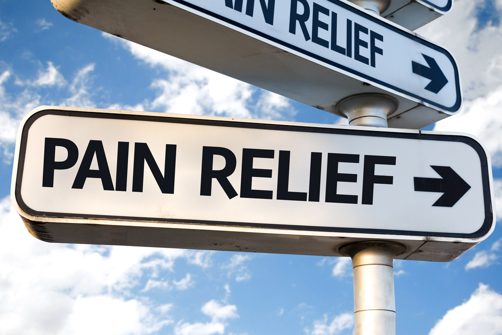 Pain-Relief-direction-sign-on-sky-background